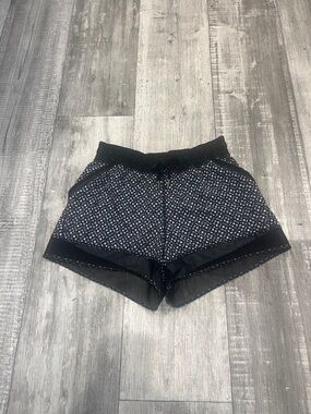 Lululemon black and white dottie eyelet shorts. Size 4.